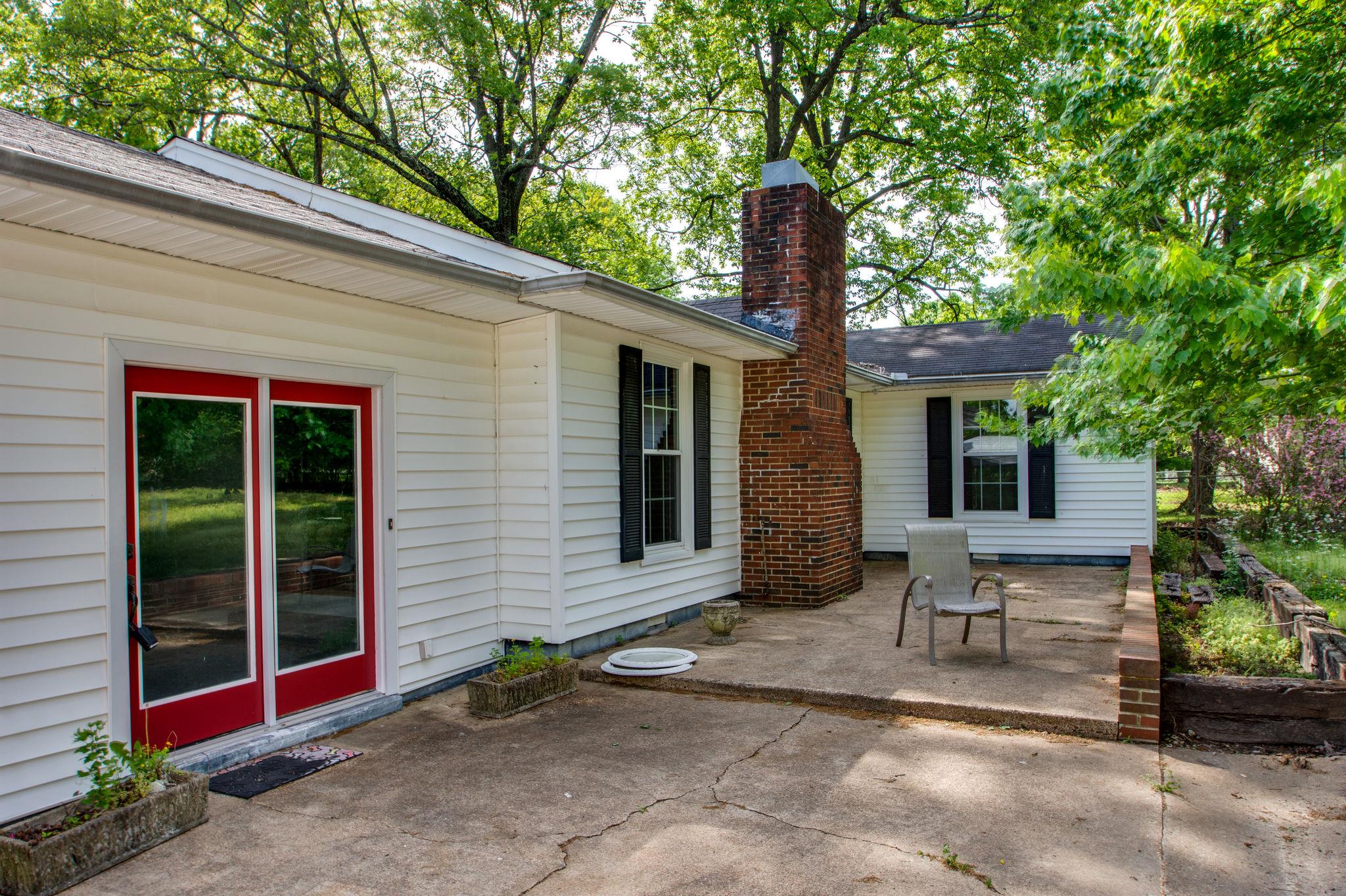 7431 Johnny Crow Road Lyles, TN 37098 - Photo 3 of 22 Front Deck is large and inviting