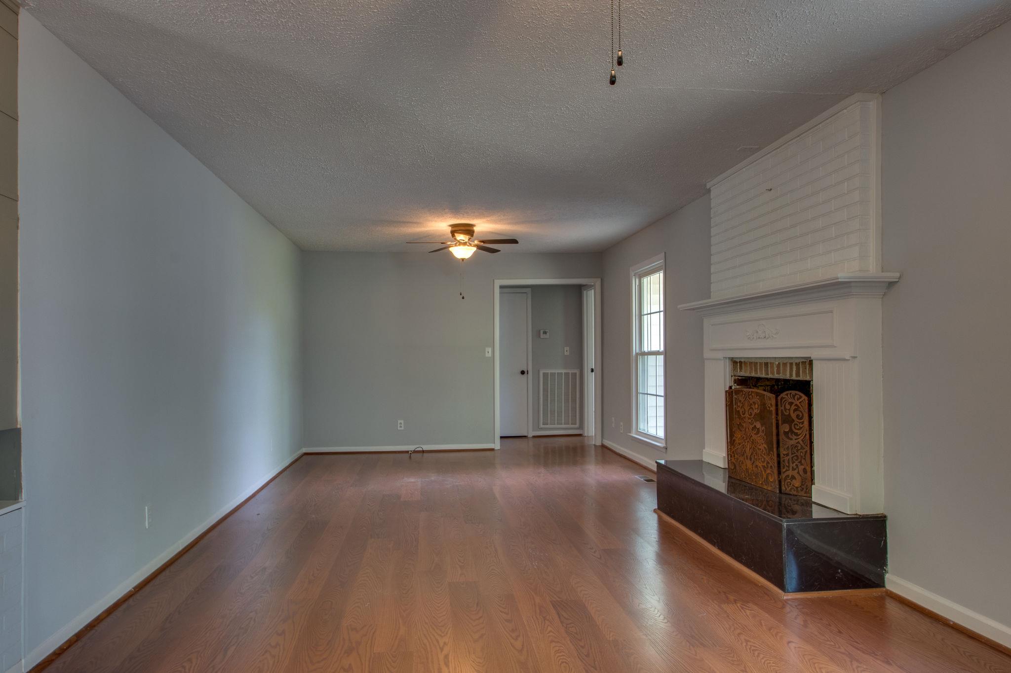 7431 Johnny Crow Road Lyles, TN 37098 - Photo 6 of 22 Large living area with fireplace!