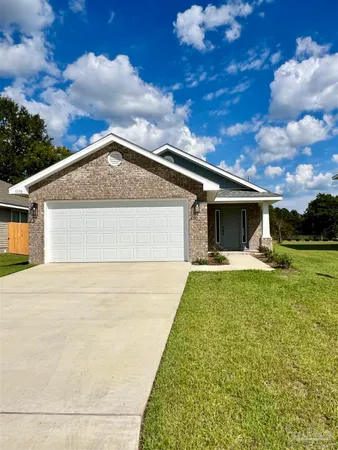 a front view of house with yard