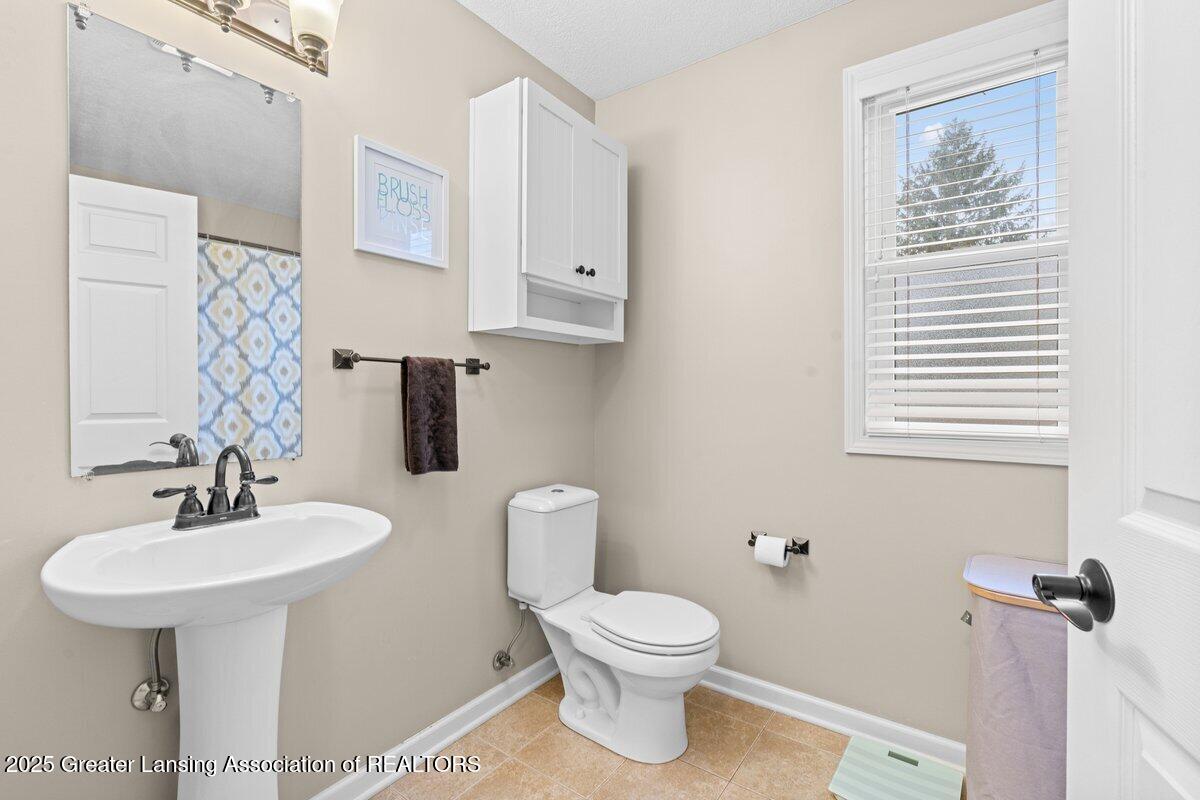 2036 Reo Road Lansing, MI 48910 - Photo 16 of 29 Media Jett - 21