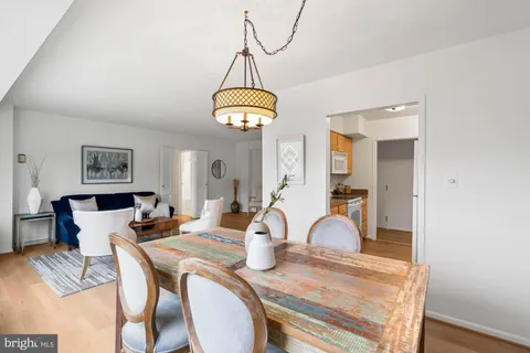 a view of a kitchen with appliances and cabinets