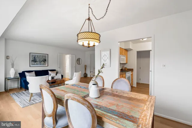 a view of a kitchen with appliances and cabinets