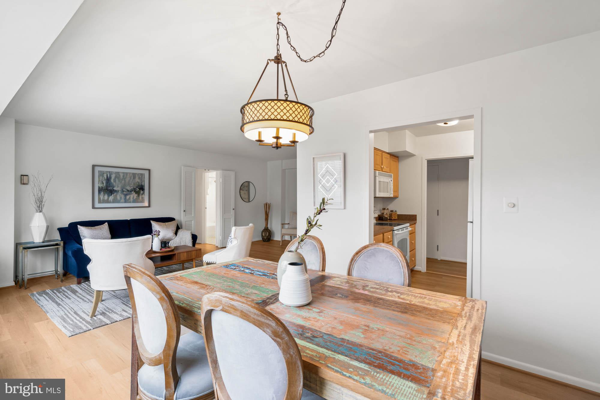 5100 Dorset Avenue, Unit 111 Chevy Chase, MD 20815 - Photo 24 of 38 a view of a dining room with furniture
