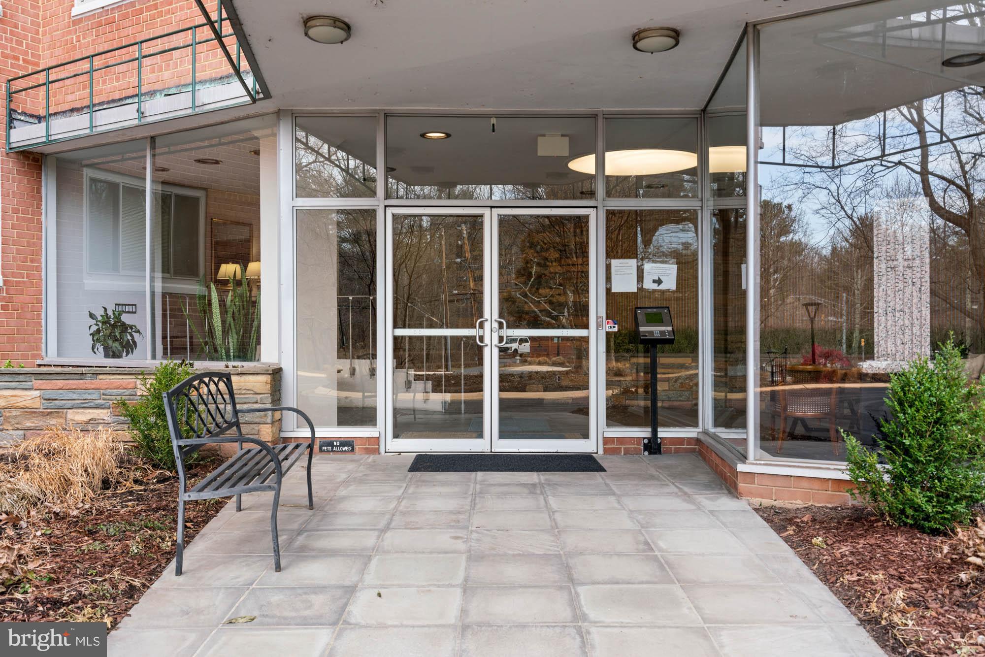 5100 Dorset Avenue, Unit 111 Chevy Chase, MD 20815 - Photo 5 of 38 a view of a house with porch and sitting area