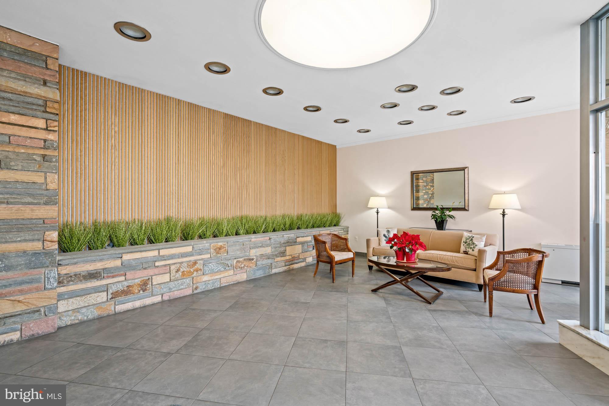 5100 Dorset Avenue, Unit 111 Chevy Chase, MD 20815 - Photo 8 of 38 a living room with furniture