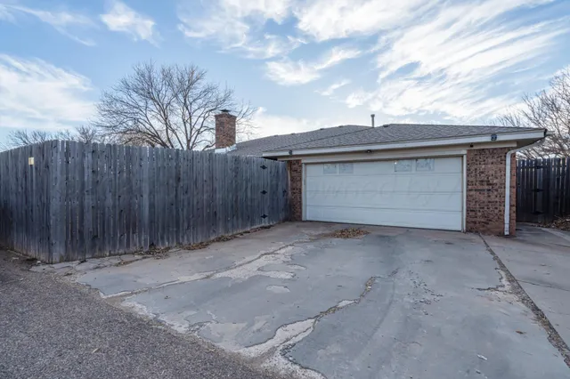 a view of backyard of house
