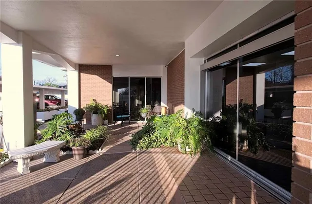 a view of swimming pool with outdoor seating