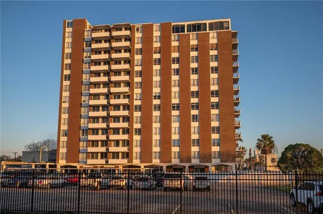 a view of a balcony with furniture