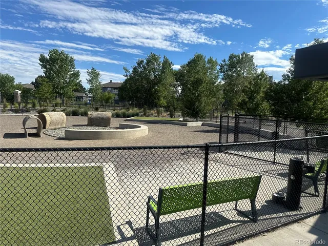 a view of swimming pool with outdoor seating