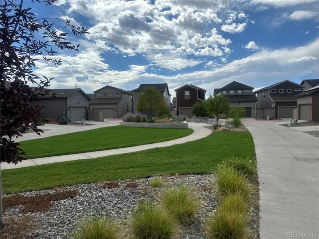 a view of a backyard of the house