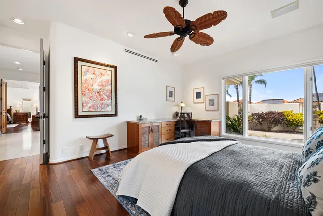 a large bathroom with a double vanity sink a mirror and a shower