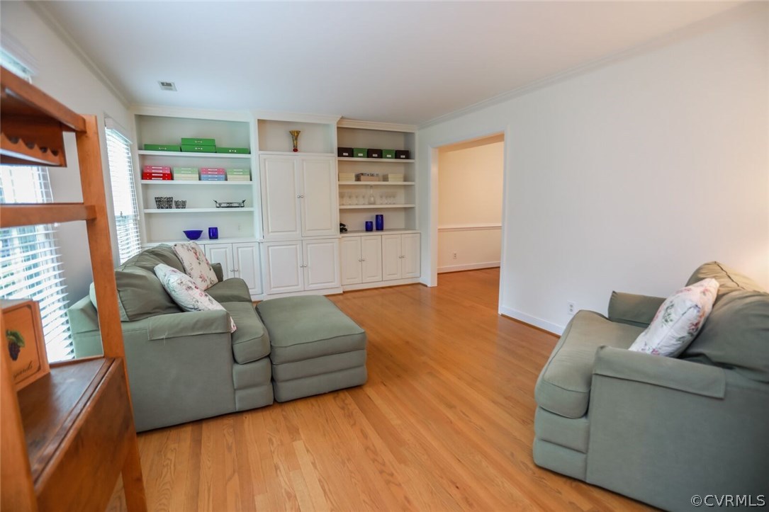 3002 Cove Ridge Road Midlothian, VA 23112 - Photo 5 of 36 a living room with furniture and a wooden floor
