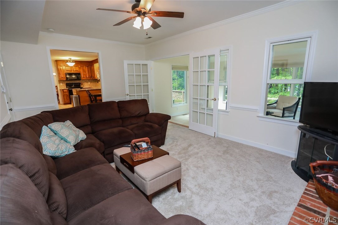 3002 Cove Ridge Road Midlothian, VA 23112 - Photo 8 of 36 a living room with furniture and a flat screen tv