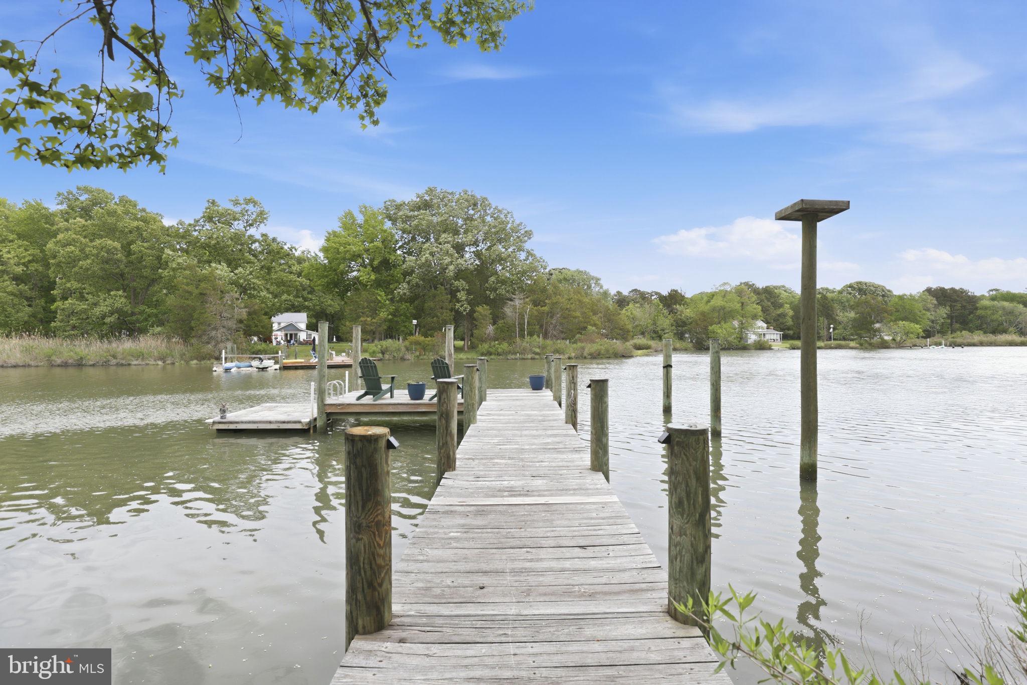 5865 Deale Beach Road Deale, MD 20751 - Photo 3 of 50 Serene dock by tranquil waters.