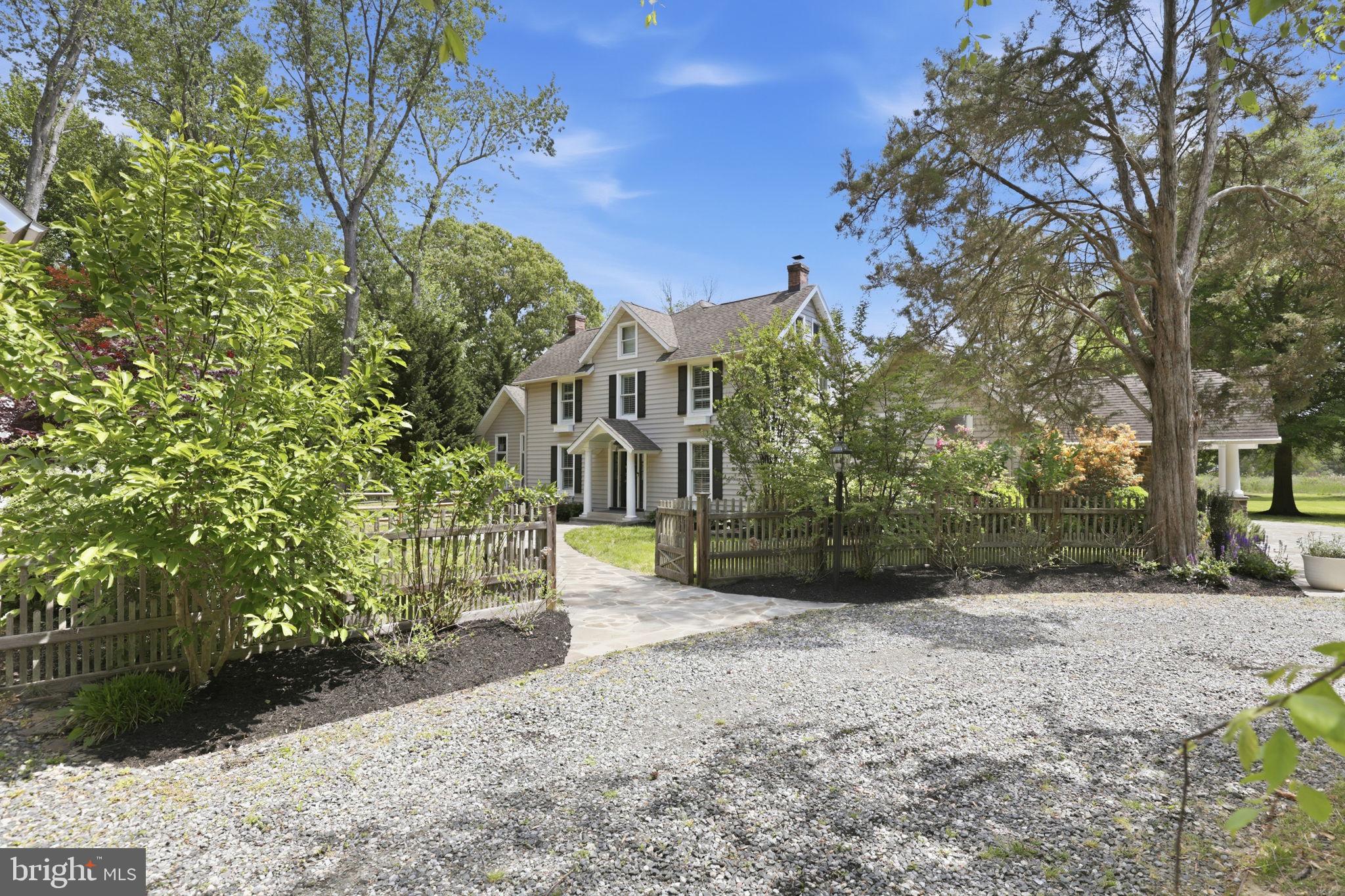 5865 Deale Beach Road Deale, MD 20751 - Photo 4 of 50 Charming home with lush greenery.