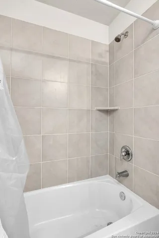 a bathroom with a bathtub