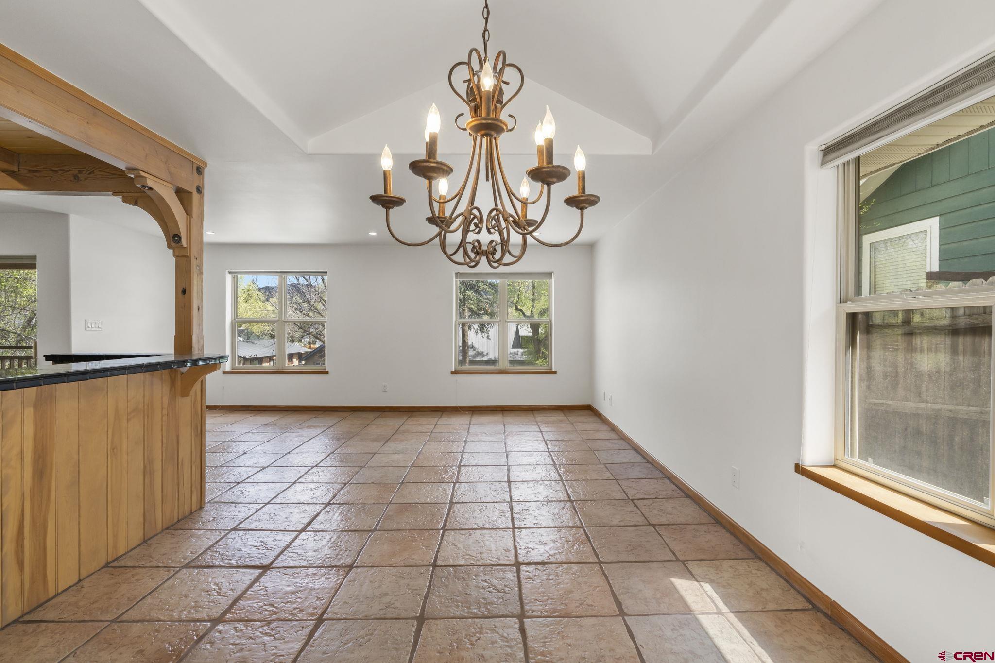 2015 West 3rd Avenue Durango, CO 81301 - Photo 11 of 32 a view of a hallway with a chandelier