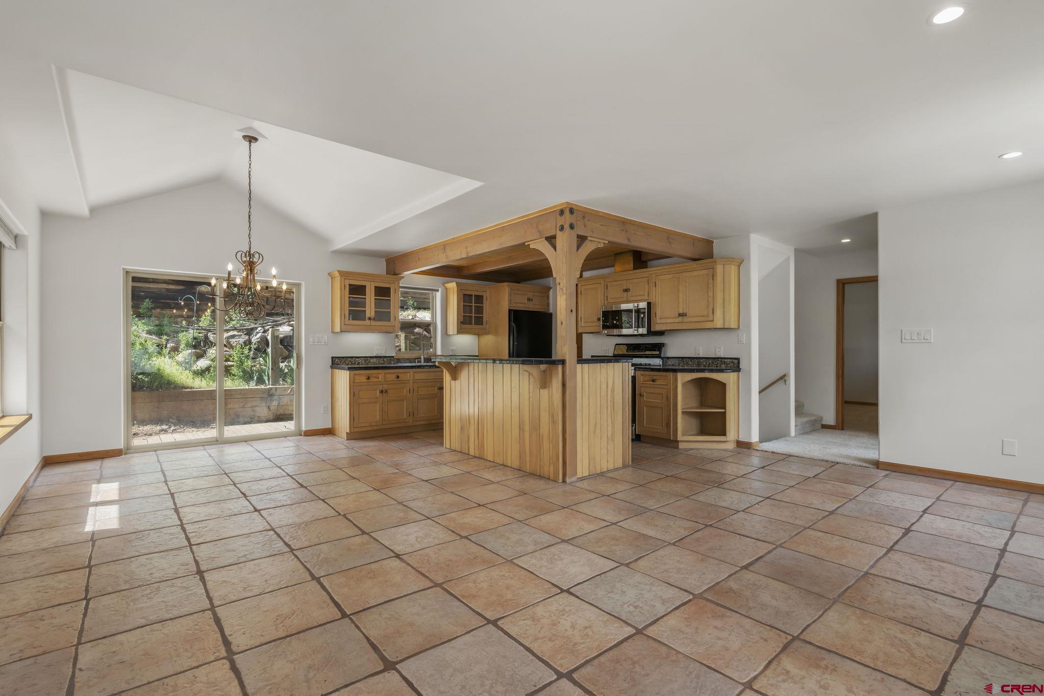 2015 West 3rd Avenue Durango, CO 81301 - Photo 13 of 32 a view of a kitchen with microwave and refrigerator