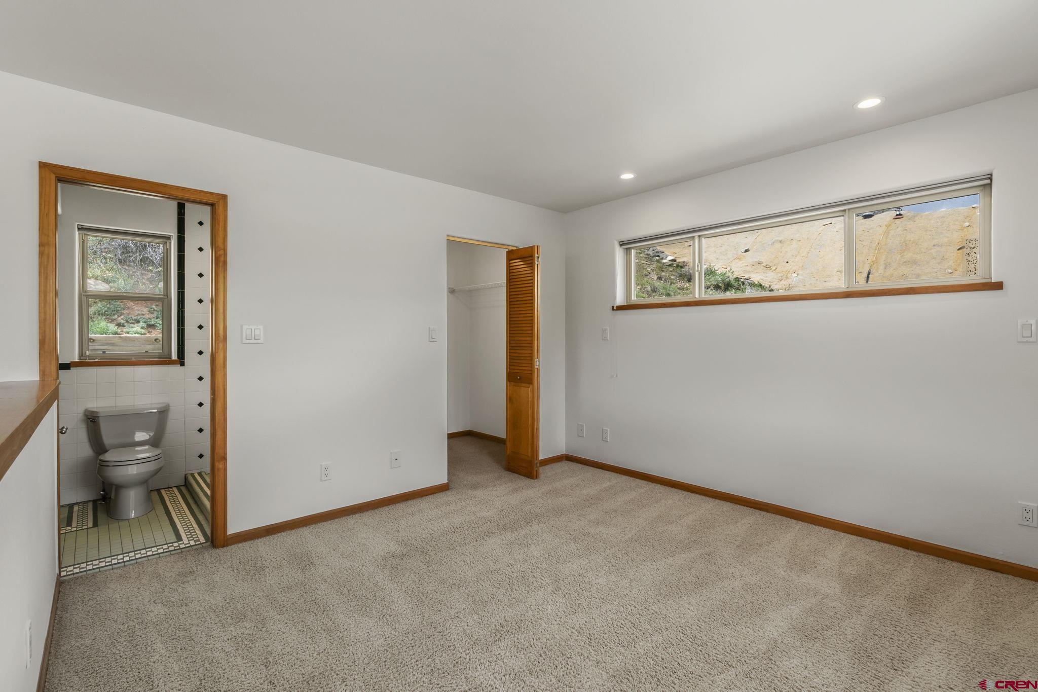 2015 West 3rd Avenue Durango, CO 81301 - Photo 22 of 32 a view of an empty room with a window