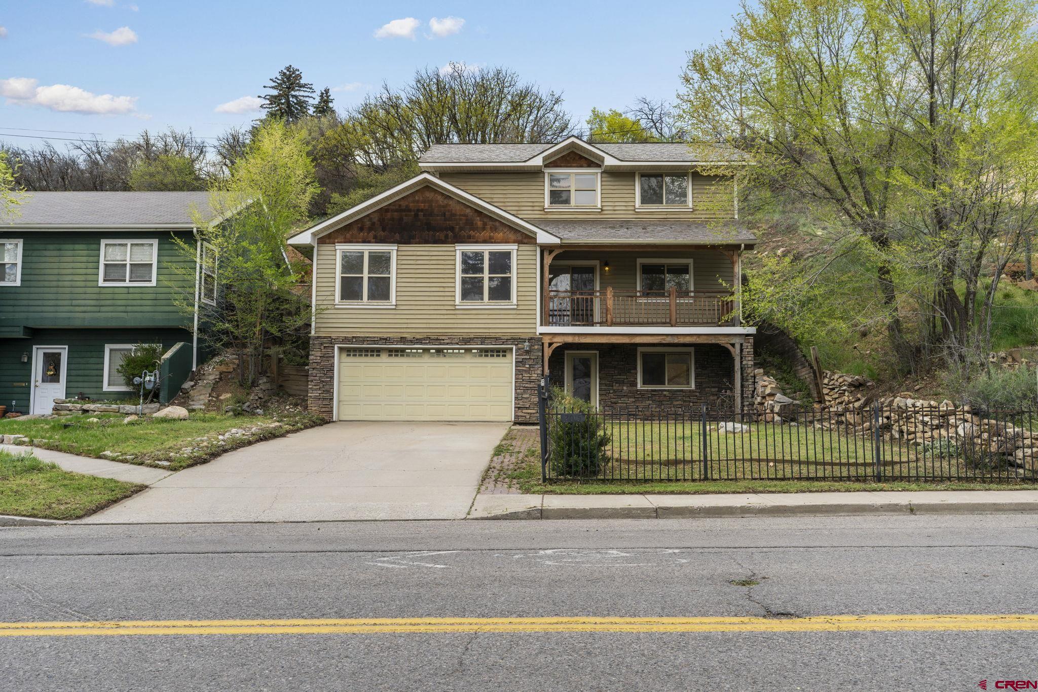 2015 West 3rd Avenue Durango, CO 81301 - Photo 27 of 32 a front view of a house with a yard