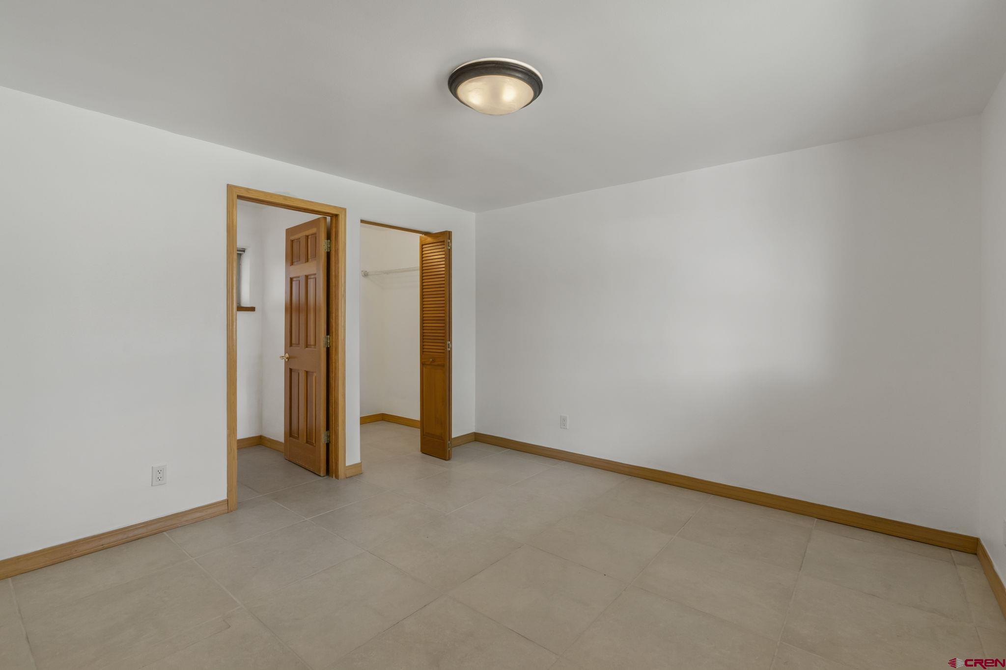 2015 West 3rd Avenue Durango, CO 81301 - Photo 5 of 32 a view of an empty room with a window