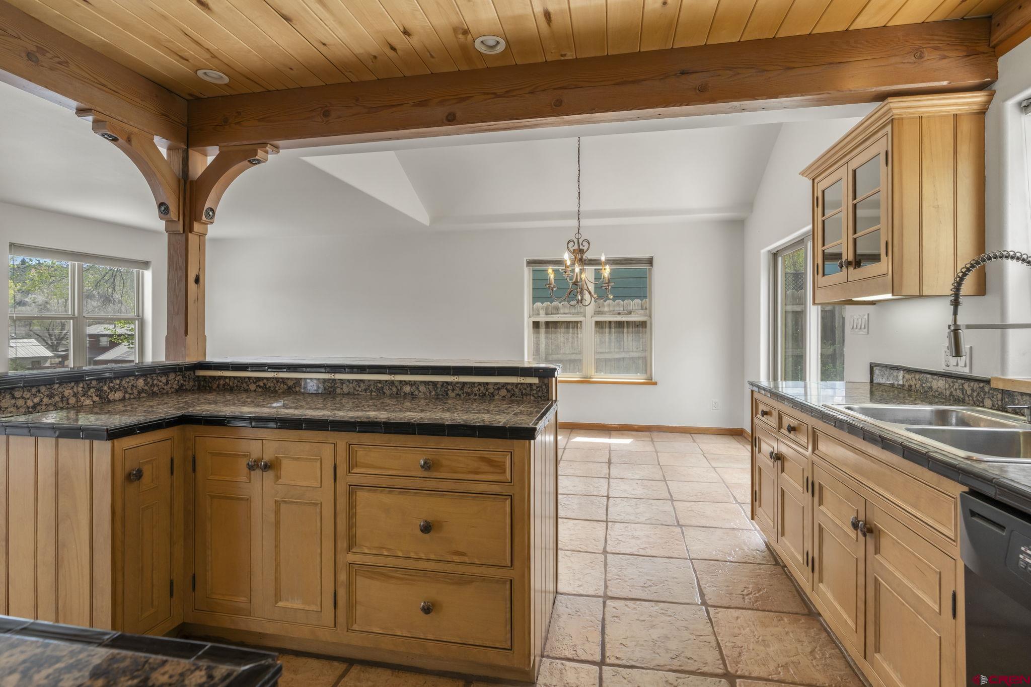 2015 West 3rd Avenue Durango, CO 81301 - Photo 9 of 32 a kitchen with a stove and a sink