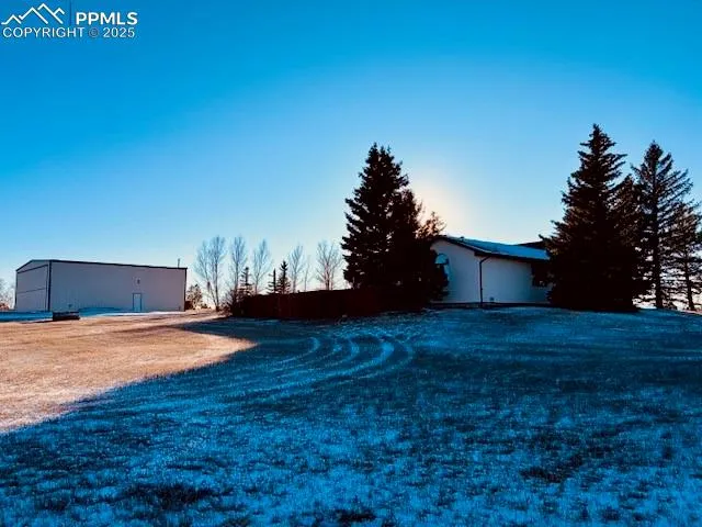 a house view with a backyard space
