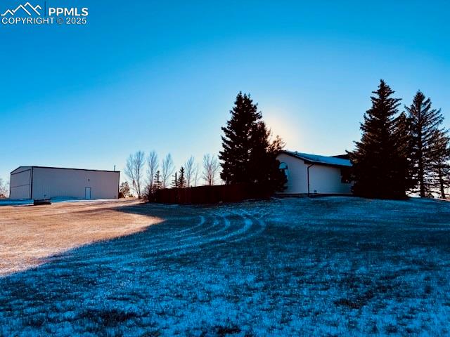 24988 Ben Kelly Road Elbert, CO 80106 - Photo 6 of 34 a house view with a backyard space
