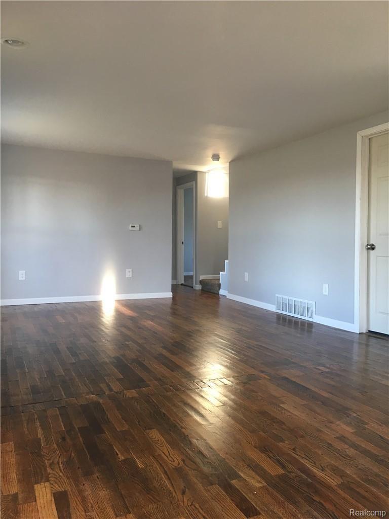 8144 Lansing Road Durand, MI 48429 - Photo 11 of 27 dining room living room.jpg