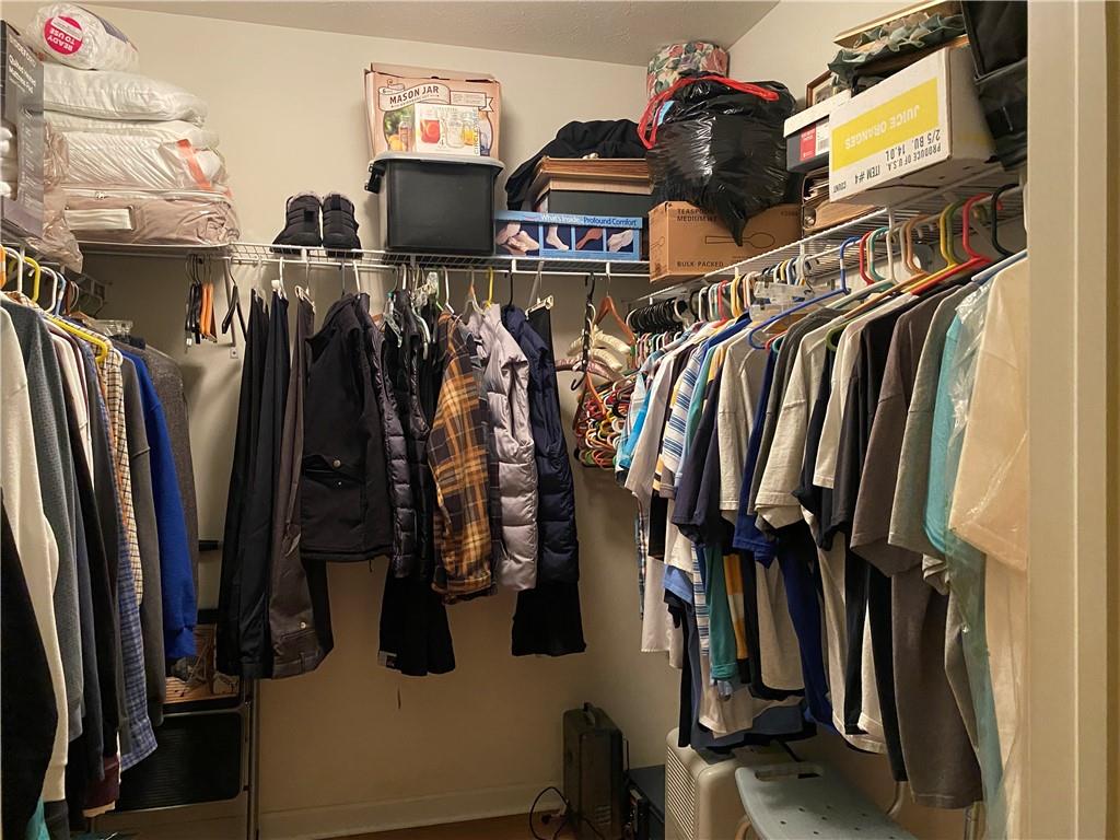 17 Elena Avenue Lower Burrell, PA 15068 - Photo 11 of 13 a view of walk in closet with clothes and shoes