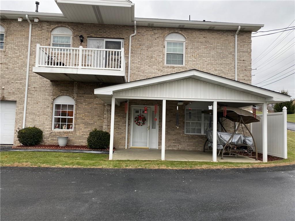 17 Elena Avenue Lower Burrell, PA 15068 - Photo 2 of 13 a view of a house with a garden and pathway
