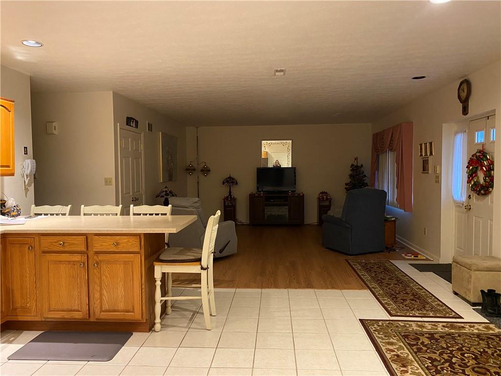 17 Elena Avenue Lower Burrell, PA 15068 - Photo 5 of 13 a large bathroom with a sink and a mirror