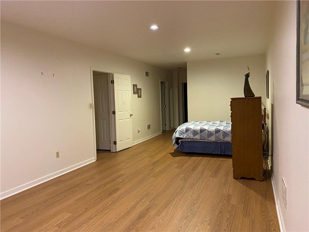 17 Elena Avenue Lower Burrell, PA 15068 - Photo 9 of 13 a bedroom with a bed and a walk in closet