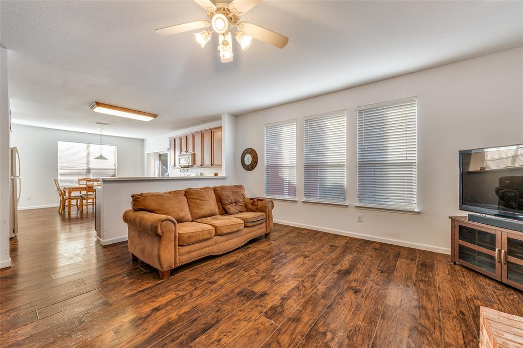 2516 Quail Ridge Road Melissa, TX 75454 - Photo 14 of 30 a living room with furniture and a flat screen tv