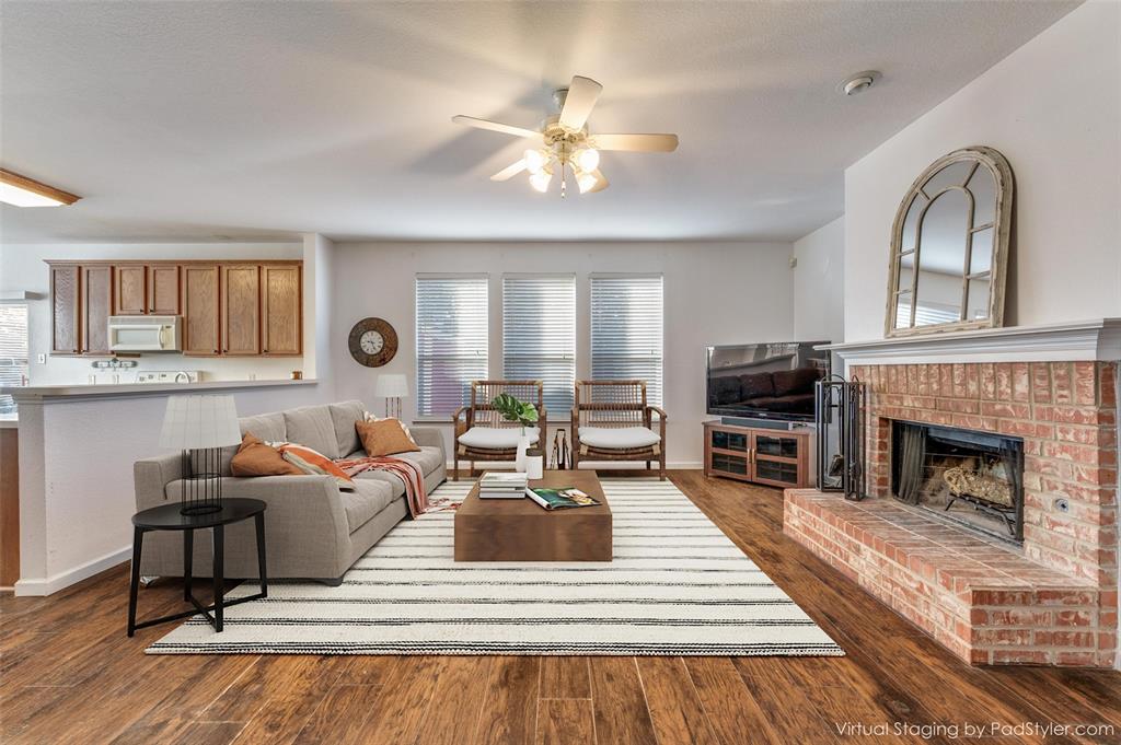 2516 Quail Ridge Road Melissa, TX 75454 - Photo 2 of 30 a living room with furniture and a fireplace