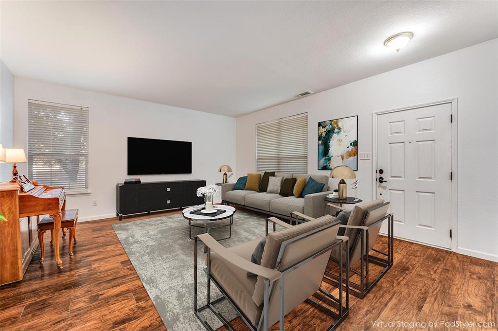 2516 Quail Ridge Road Melissa, TX 75454 - Photo 5 of 30 a living room with furniture and a flat screen tv