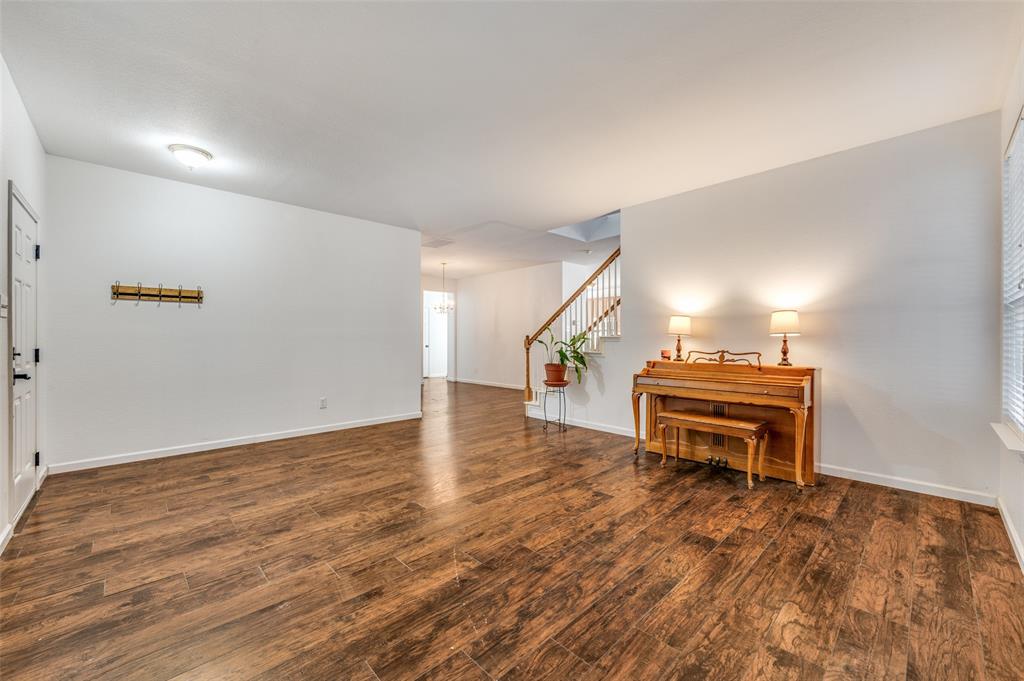 2516 Quail Ridge Road Melissa, TX 75454 - Photo 7 of 30 a view of a livingroom with furniture and wooden floor