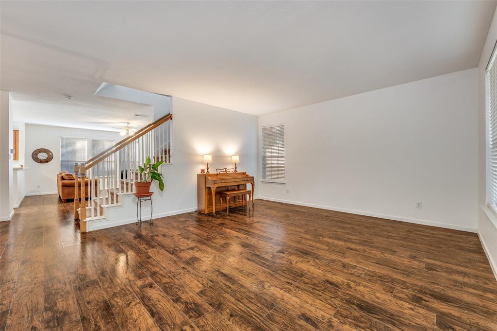 2516 Quail Ridge Road Melissa, TX 75454 - Photo 8 of 30 a living room with furniture and a dining room