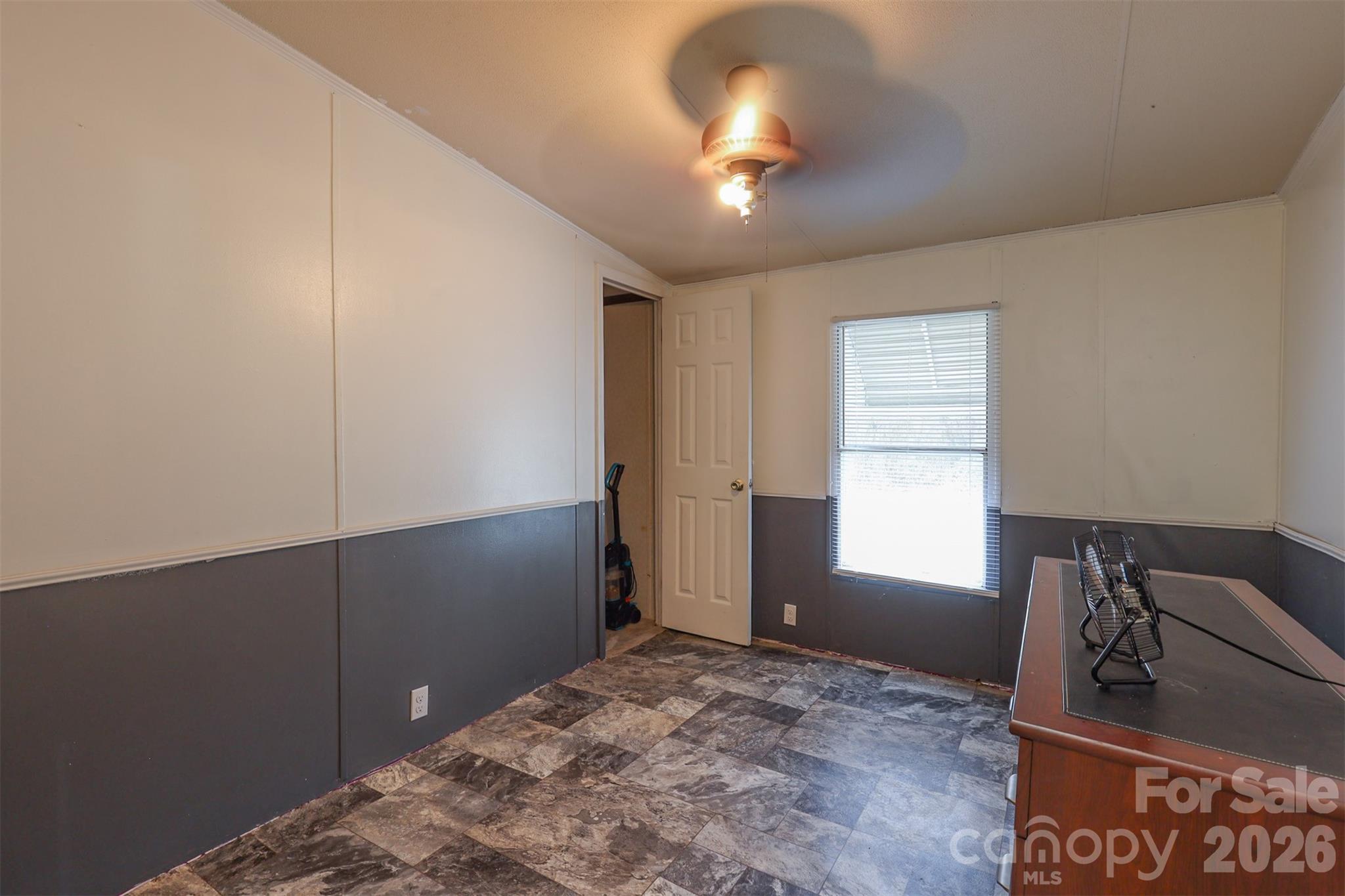 1224 Astoria Road Jamesville, NC 27846 - Photo 12 of 34 a view of empty room with window and ceiling fan