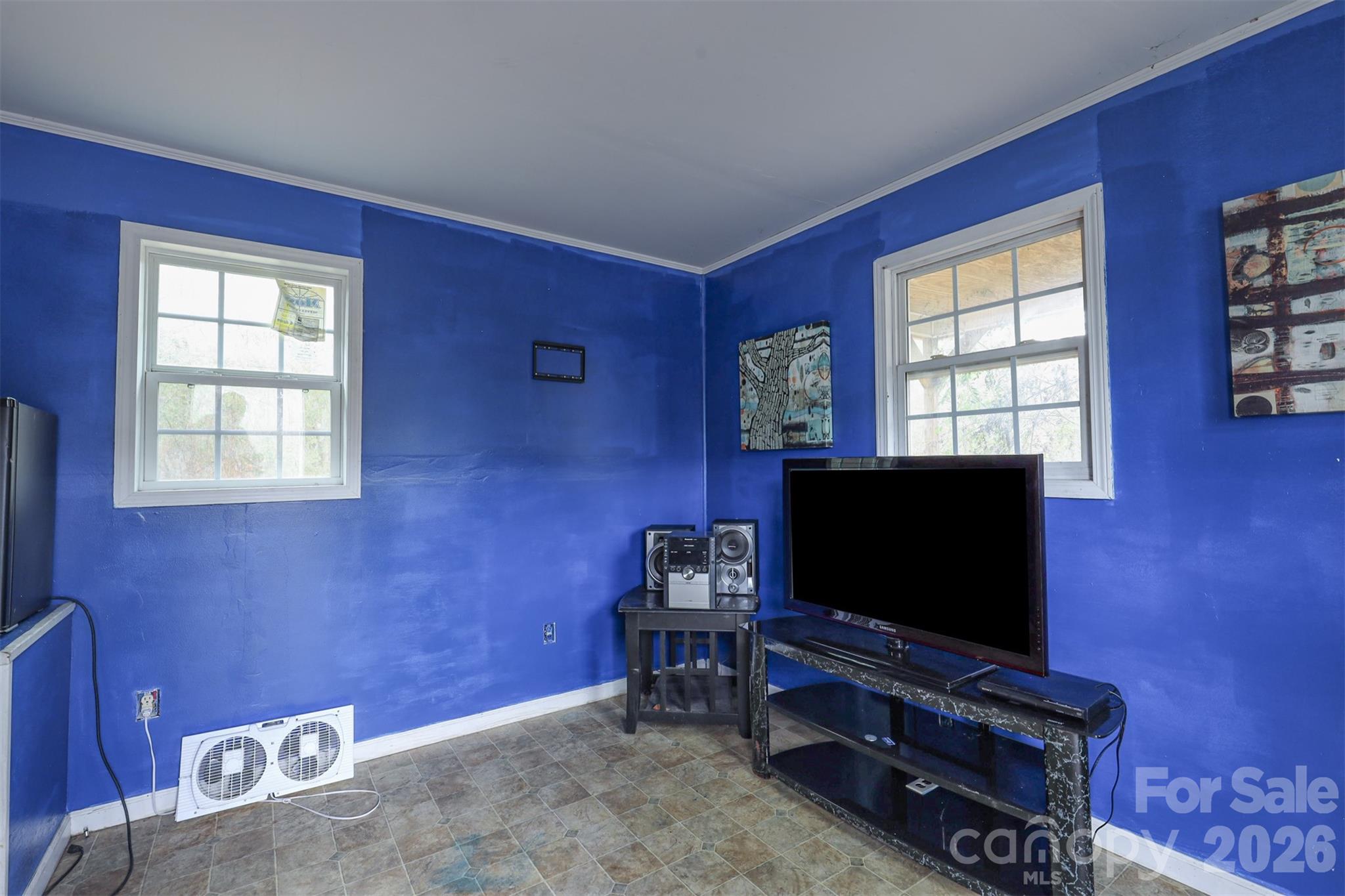 1224 Astoria Road Jamesville, NC 27846 - Photo 31 of 34 a living room with furniture and a flat screen tv