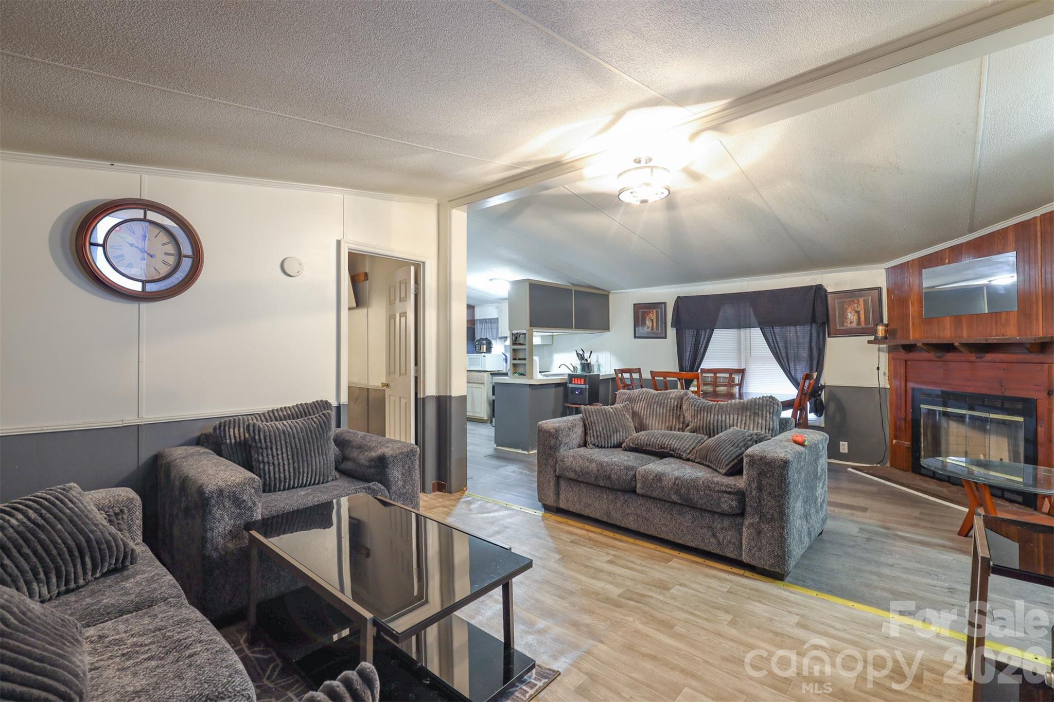 1224 Astoria Road Jamesville, NC 27846 - Photo 7 of 34 a living room with furniture and a fireplace