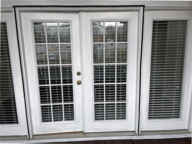 a view of front door with balcony