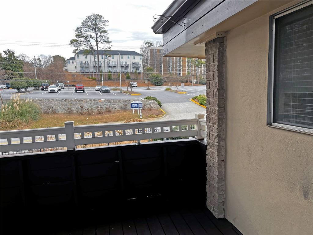346 Carpenter Drive Northeast, Unit 7 Atlanta, GA 30328 - Photo 8 of 16 a view of swimming pool from a balcony