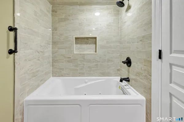 a bathroom with a bathtub
