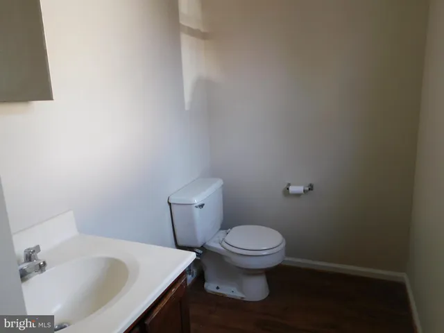 a bathroom with a sink and toilet