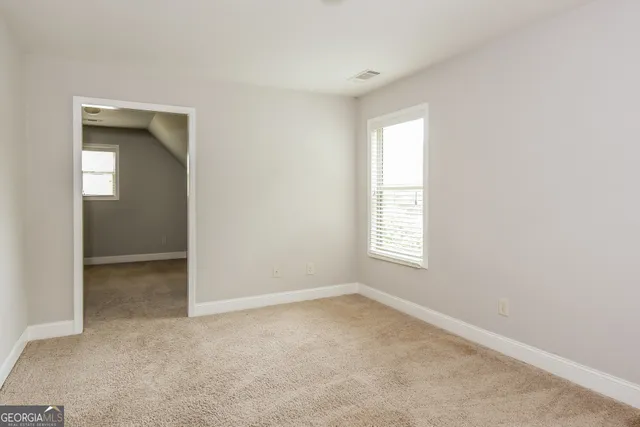 an empty room with a window