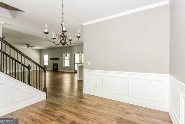a view of a livingroom with wooden floor
