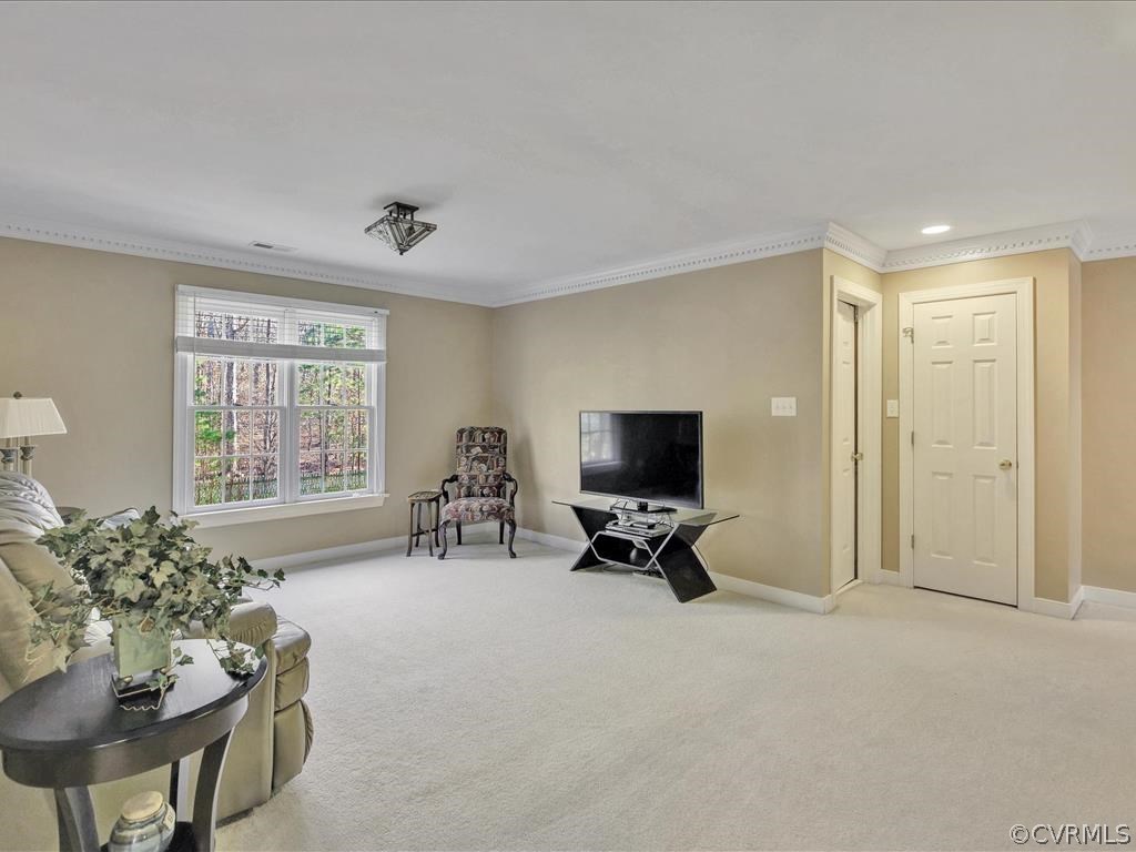 2731 Founders Bridge Road Midlothian, VA 23113 - Photo 23 of 34 Loft area ~ crown moulding, carpet