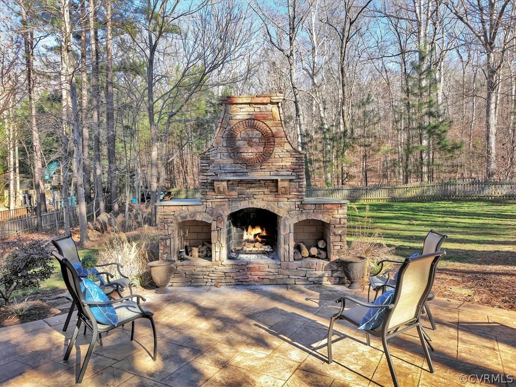 2731 Founders Bridge Road Midlothian, VA 23113 - Photo 3 of 34 Wonderful stone wood burning fireplace on a large