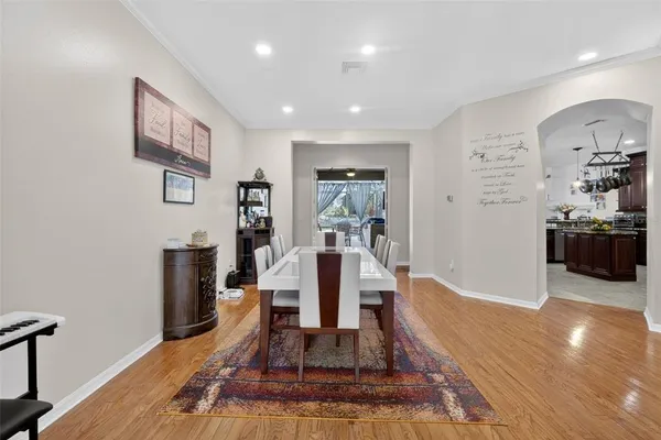 a view of a living room and dining room